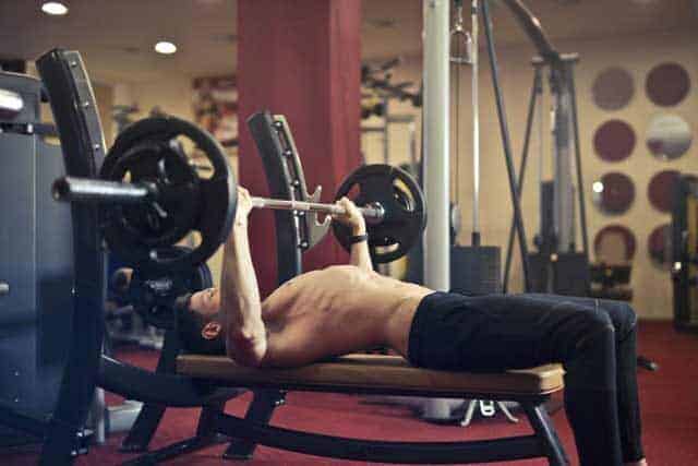 A man working out in a home gym