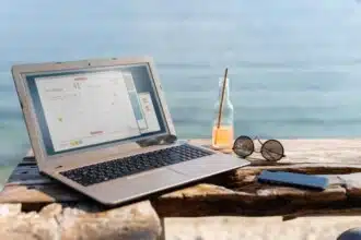 arrangement with laptop seaside