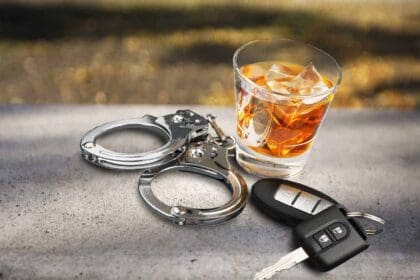 drunk driving alcoholism alcohol police handcuffs key whisky