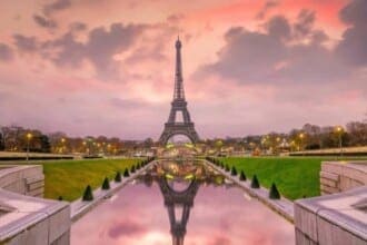 eiffel tower sunrise from trocadero fountains paris france