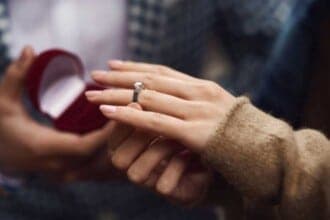 hands young couple girl wears diamond ring