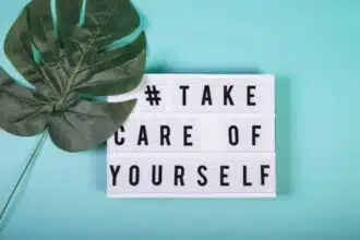 lightbox with motivational words selfcare mental health emotional wellbeing top view