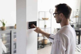 man using tablet his smart home