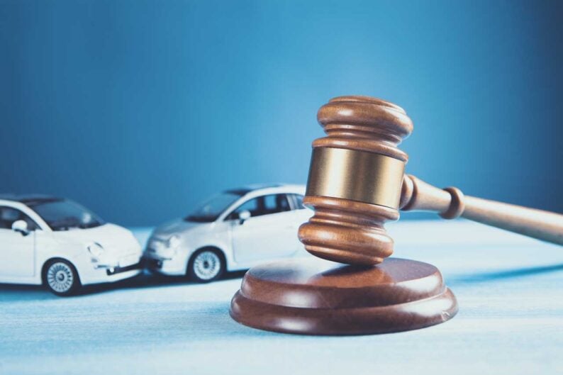 model car gavel accident lawsuit insurance court case
