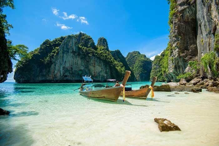 view thai traditional longtail boat clear sea sky sunny day phi phi islands thailand