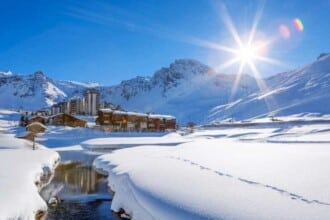 view tignes village with sun france