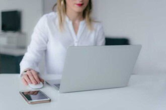 woman using silver laptop 2265488