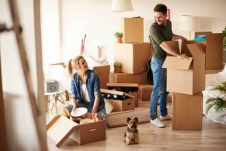 young couple new apartment with small dog 1