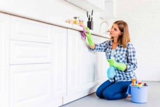 young woman cleaning house