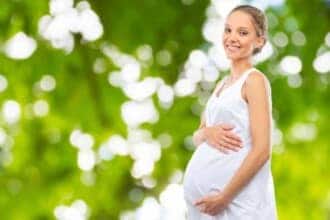 portrait young happy smiling pregnant woman