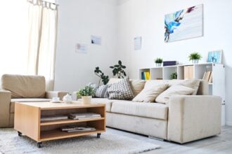 Cozy living room with abstract picture on wall