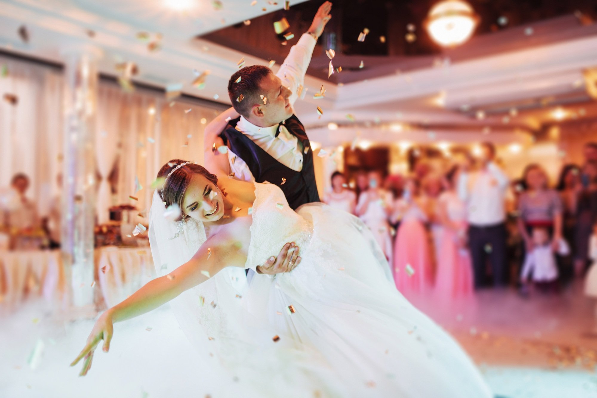 Happy bride and groom their first dance