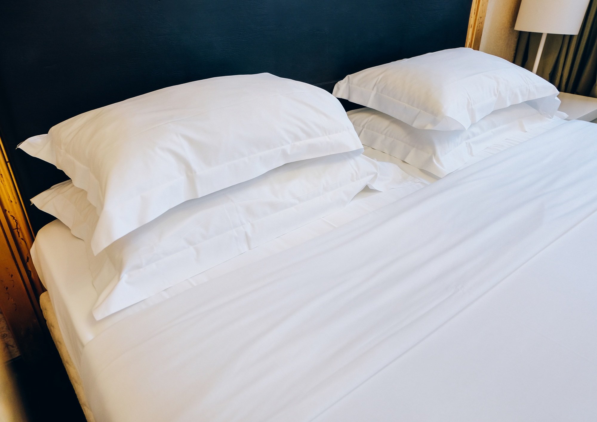 double bed with white sheets