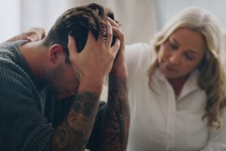 Sad, stress and depression people in therapy for mental health support, empathy and professional he
